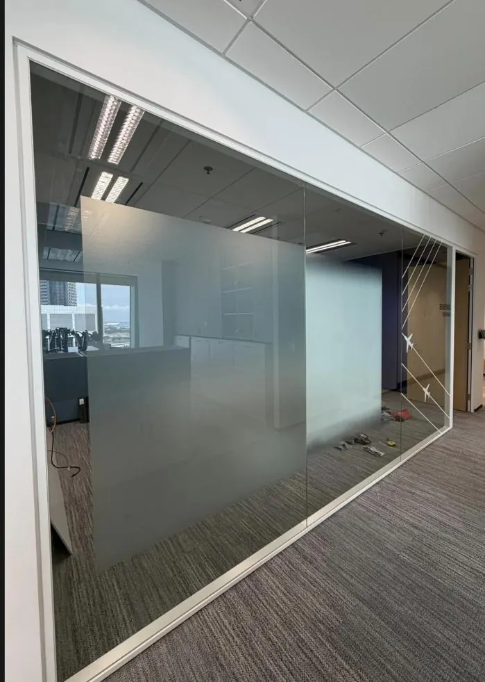 Boeing: full-height glass partition with a frosted privacy band